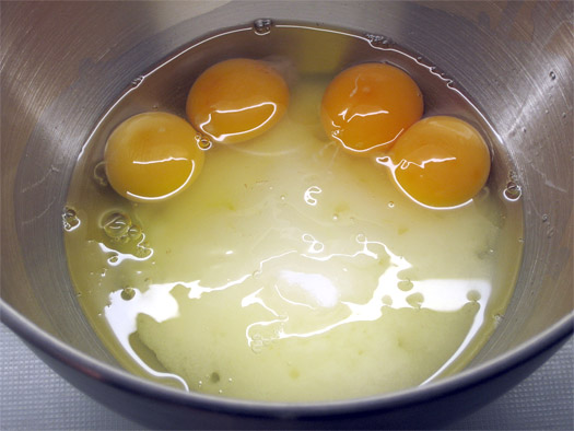 the eggs and sugar in a bowl