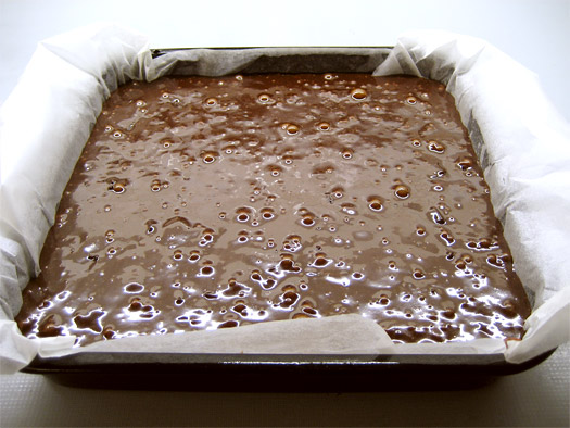 filling the tin for the oven