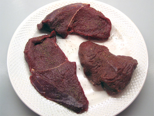seasoning the steaks