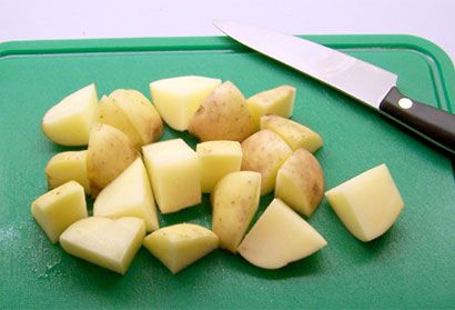 cut, raw roast potatoes
