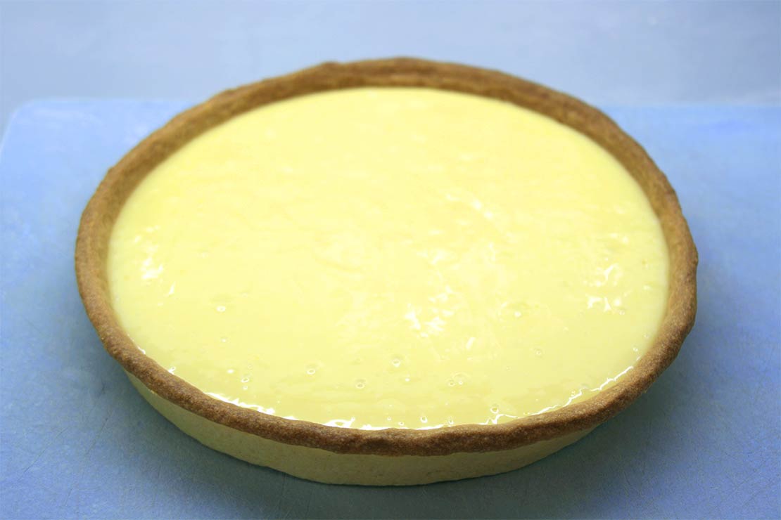 the pastry case filled with the lemon curd