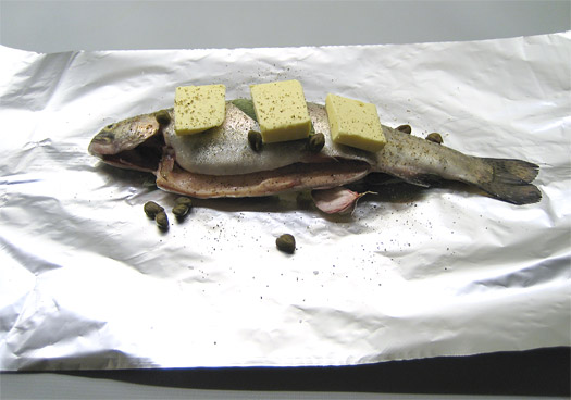 the fish with the ingredients on the foil