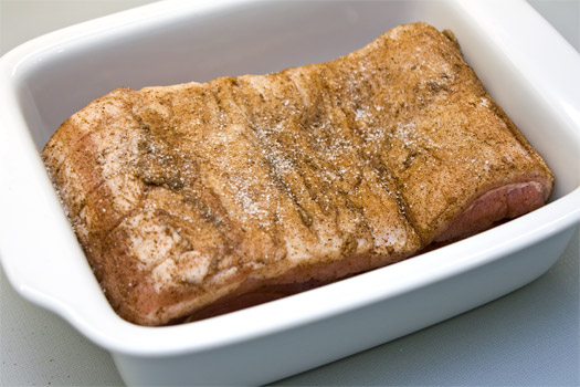 the rolled up, seasoned pork belly