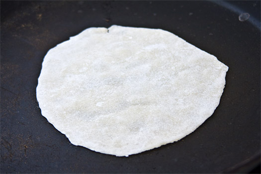 dry frying the first side of the pancake
