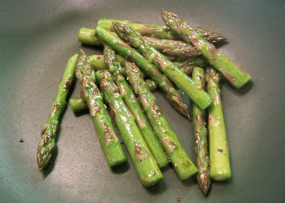 frying the asparagus